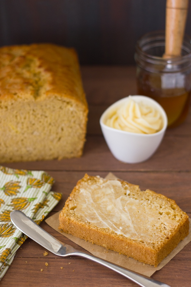 Honey and Beer Cornbread - a fusion of beer bread and cornbread that's tender and perfectly sweet, with crisp edges sweetened by an incredible honey butter glaze. Plus, it's super easy to make! | brighteyedbaker.com