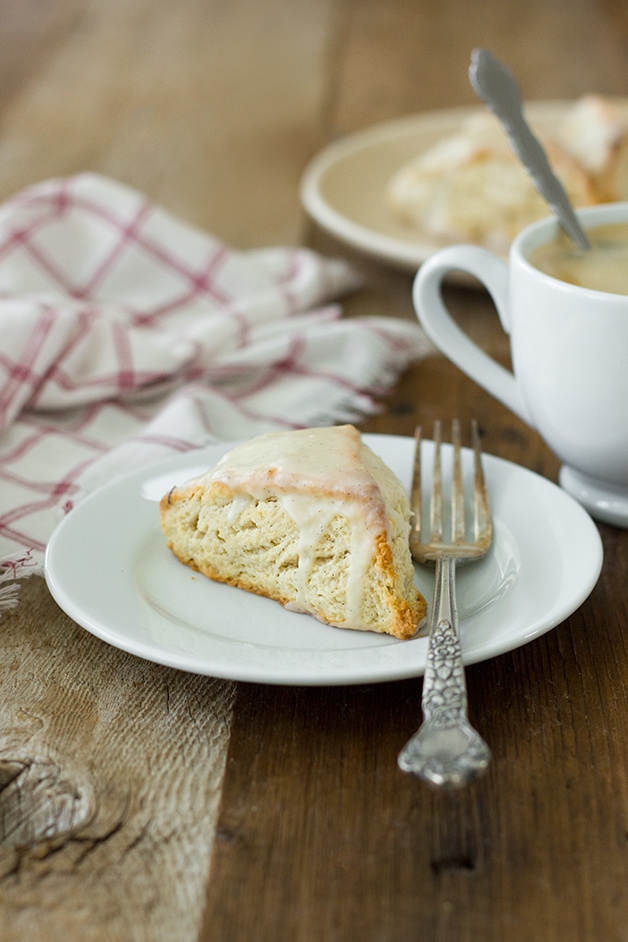 Vanilla Bean Scones | slightly crisp on the outside, tender on the inside, and topped with a sweet vanilla bean glaze for maximum flavor. | www.brighteyedbaker.com