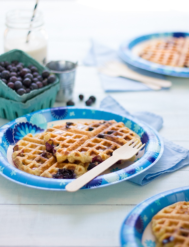 Blueberry Waffles - A simple recipe for gluten-free, dairy-free waffles with crispy edges, fluffy centers, and plenty of fresh summer berries!