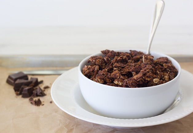 Double Chocolate, Almond, and Coconut Granola - a perfectly crunchy granola filled with chocolate-y clumps of oats, almonds, and coconut flakes, with chunks of dark chocolate in every bite. | www.brighteyedbaker.com