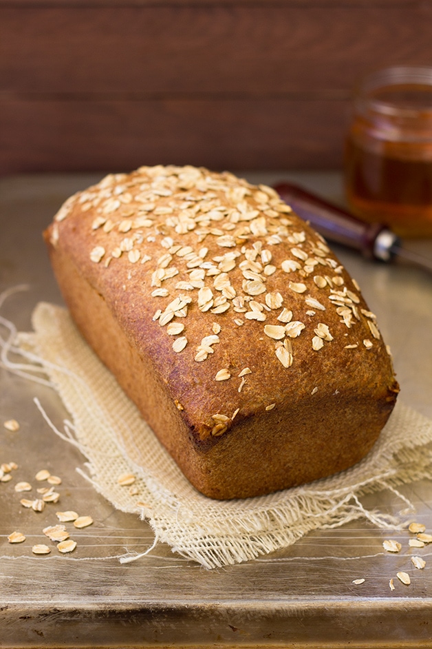 Oats and Honey Whole Wheat Bread - say goodbye to boring whole wheat bread! This version is light and tender, slightly sweet, and packed with flavor. | brighteyedbaker.com