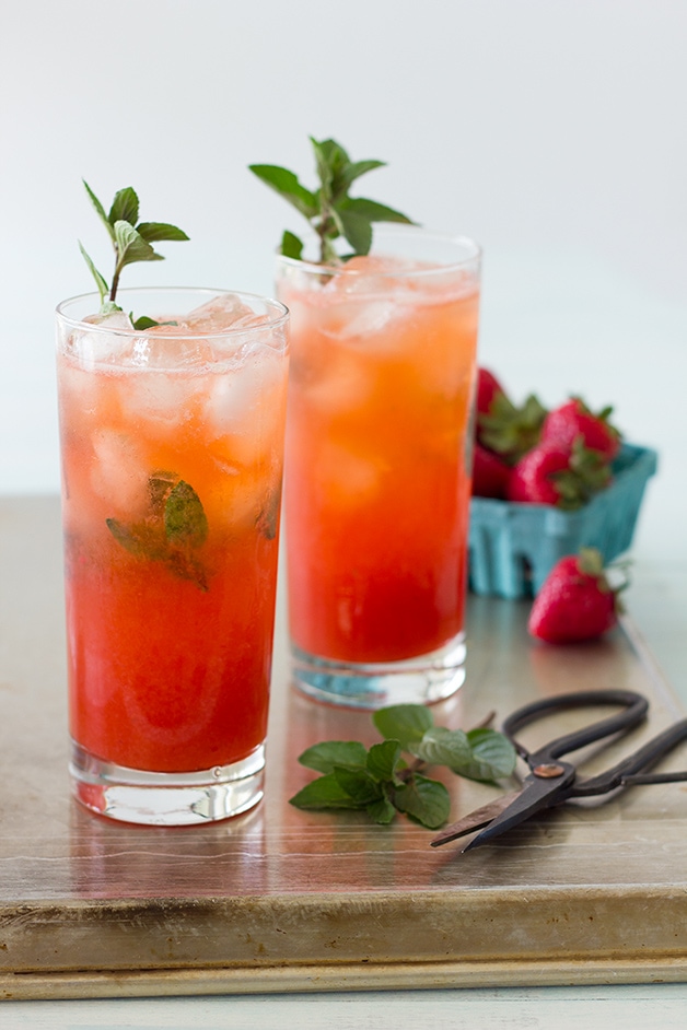 Strawberry Mojitos - a fruity twist on a classic cocktail from @brighteyedbaker | brighteyedbaker.com #cocktail #recipe