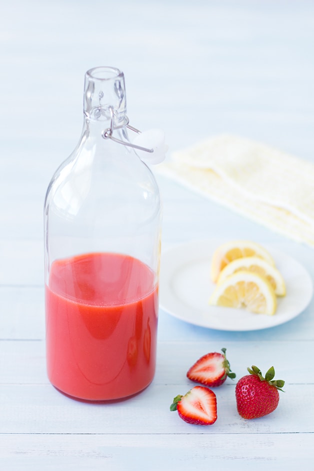 Sparkling Strawberry Lemonade Cooler - a tart-but-sweet, bubbly, and refreshing summer drink perfect for all ages. | www.brighteyedbaker.com