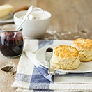 Fluffy Buttermilk Scones - simple, lightly sweetened scones, perfect with butter and jam on a lazy morning. | www.brighteyedbaker.com
