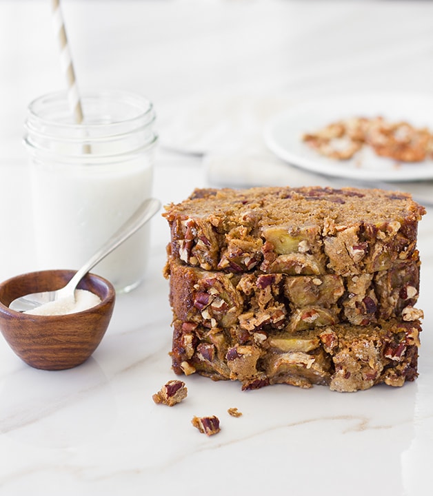 Banana Date Bread - a moist banana bread studded with sweet dates and topped with a caramelized banana-pecan crust. | www.brighteyedbaker.com #wholewheat