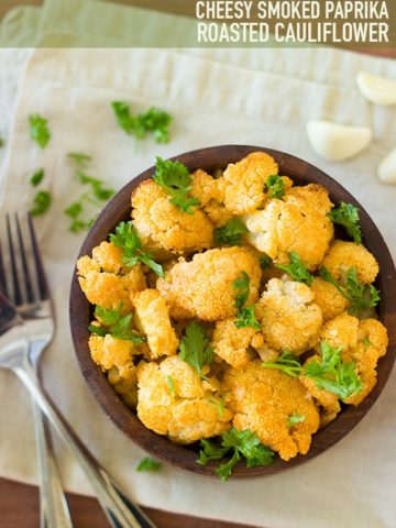 Cheesy Smoked Paprika Roasted Cauliflower - an easy, healthy, and flavor-packed vegetarian side dish. | www.brighteyedbaker.com