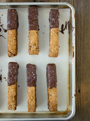 Chocolate-Dipped Caramel Chocolate Chip Biscotti - think caramel mocha in dunkable, crunchy cookie form! | www.brighteyedbaker.com