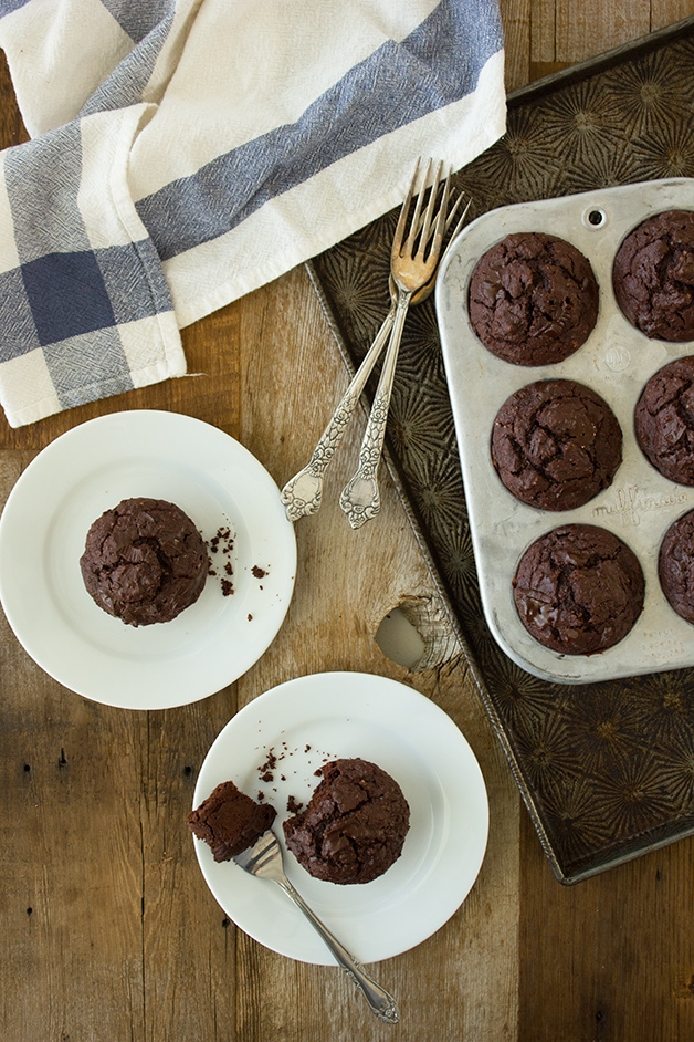 Light and tender double chocolate muffins made healthier with NO white flour, coconut oil, and just enough brown sugar for sweetness  -- a chocolatey treat without the guilt. {Dairy-Free} | www.brighteyedbaker.com