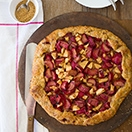 Apple & Rhubarb Galette - A flaky free-form pie piled high with juicy fruit and topped with a hefty sprinkle of raw sugar. | www.brighteyedbaker.com #OXOGreenSaver @OXO @MelissasProduce