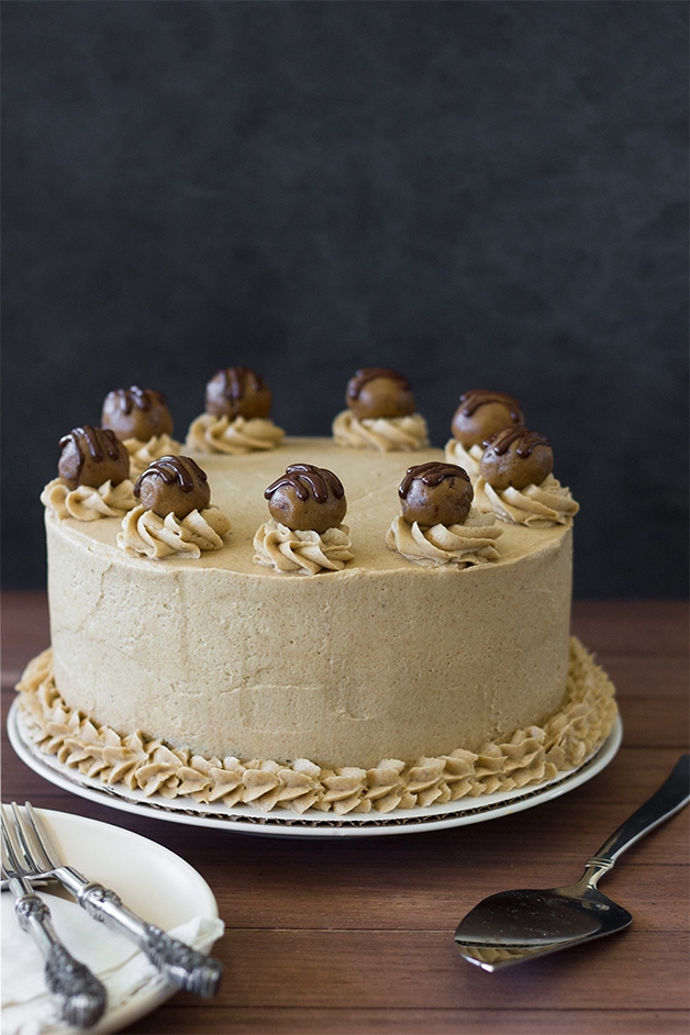 Brown Butter Chocolate Chip Cookie Dough Layer Cake - three layers of dark chocolate cake with an intense cookie dough filling and buttery brown sugar frosting. | www.brighteyedbaker.com