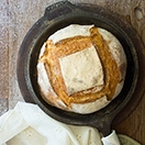 Rustic Dutch Oven Bread - a hearty, everyday bread with a thick, crunchy crust and tender crumb. | www.brighteyedbaker.com