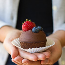 Hazelnut Financier Cupcakes with Whipped Chocolate Ganache - Light & nutty french teacakes topped with a silky coconut milk ganache and fresh berries. A show-stopper dessert that won't destroy your clean eating! {gluten-free, dairy-free, refined sugar-free}