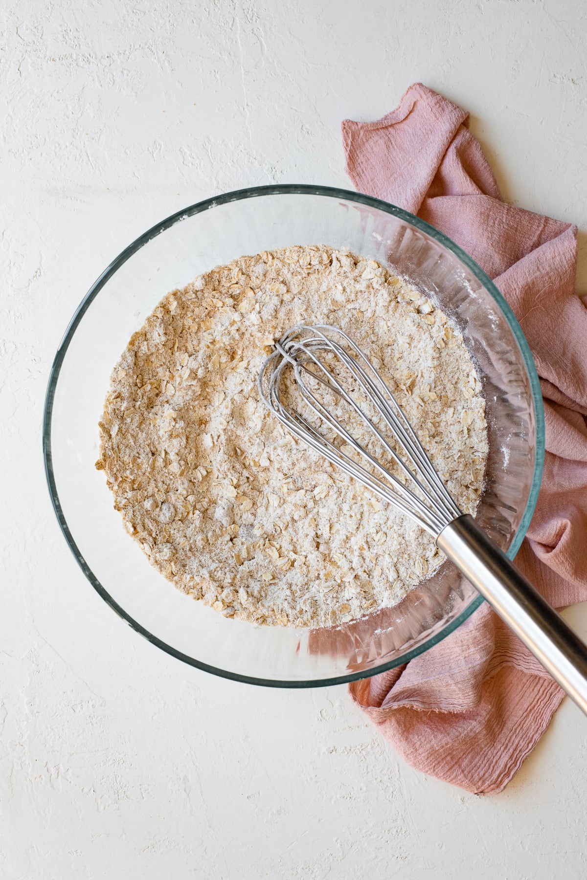 Dry ingredients for crumble topping whisked together in a large bowl
