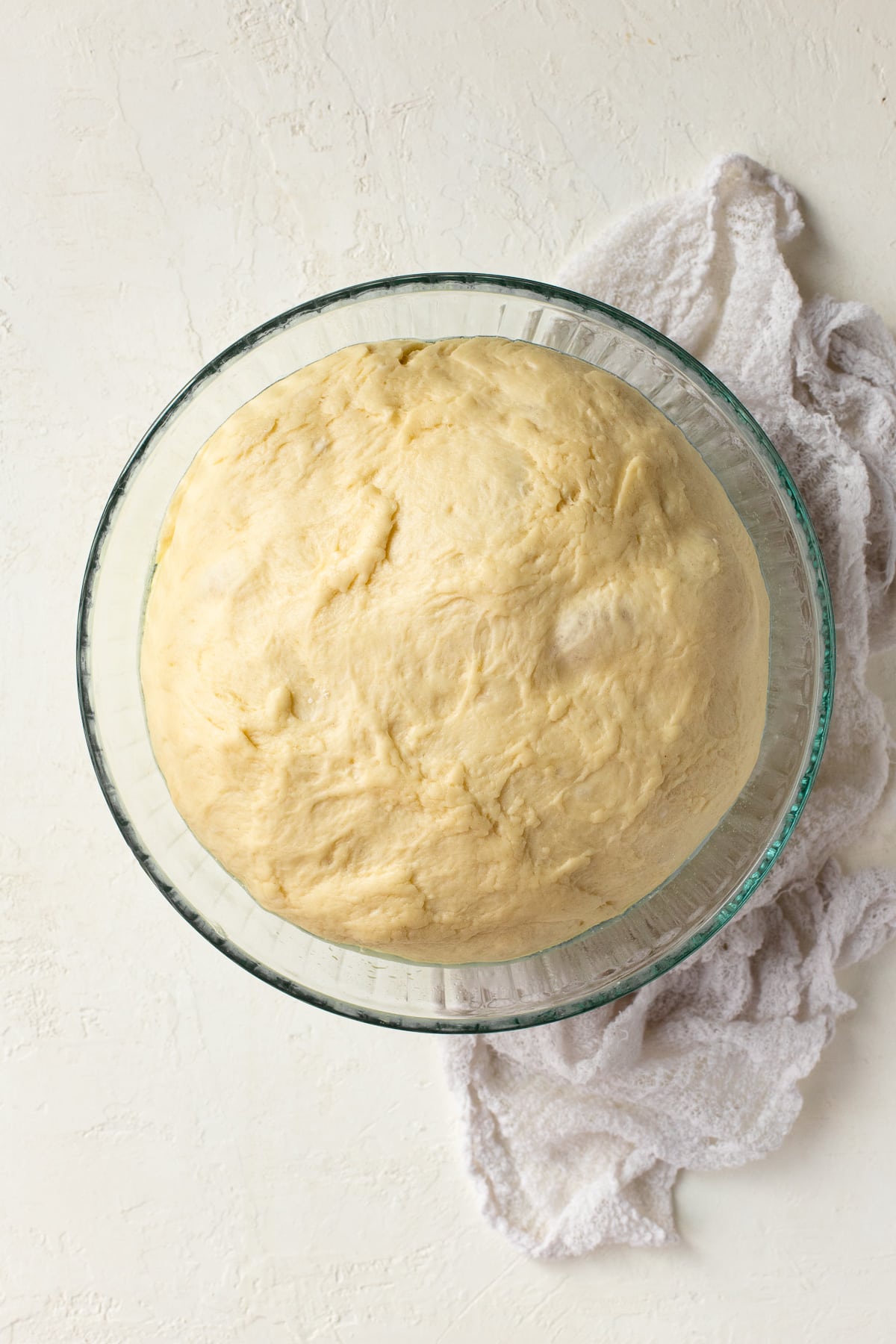 Brioche dough in bowl after rising.