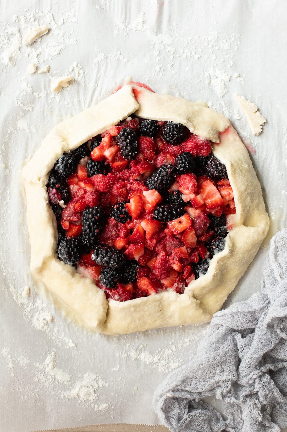 An assembled berry galette, ready to bake.