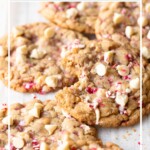 Cookies scattered on parchment paper, with a bite taken out of one. Includes recipe title overlay.