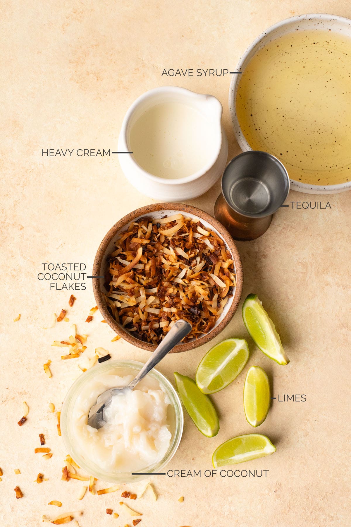 Agave syrup, heavy cream, toasted coconut flakes, limes, cream of coconut, and tequila.