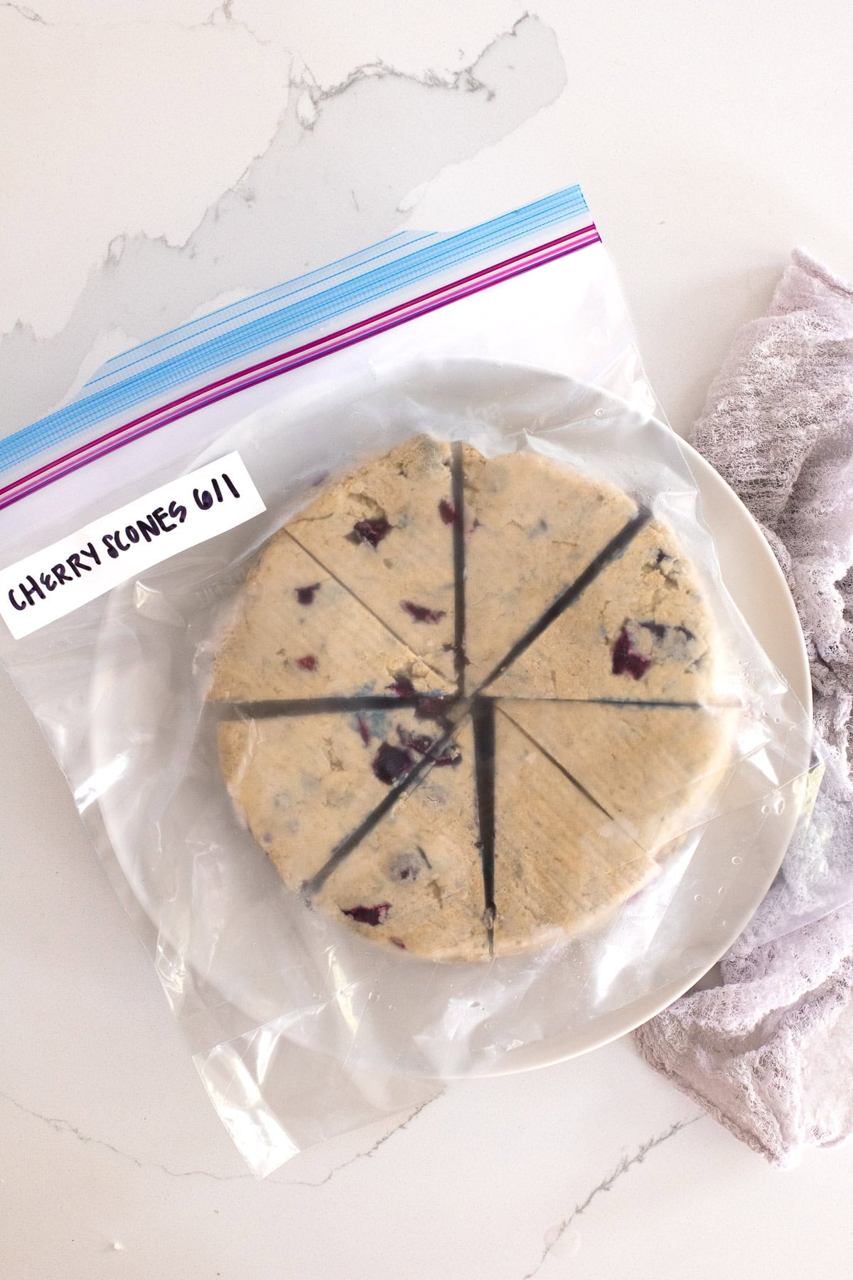 Scone dough sliced and stored in a freezer bag.